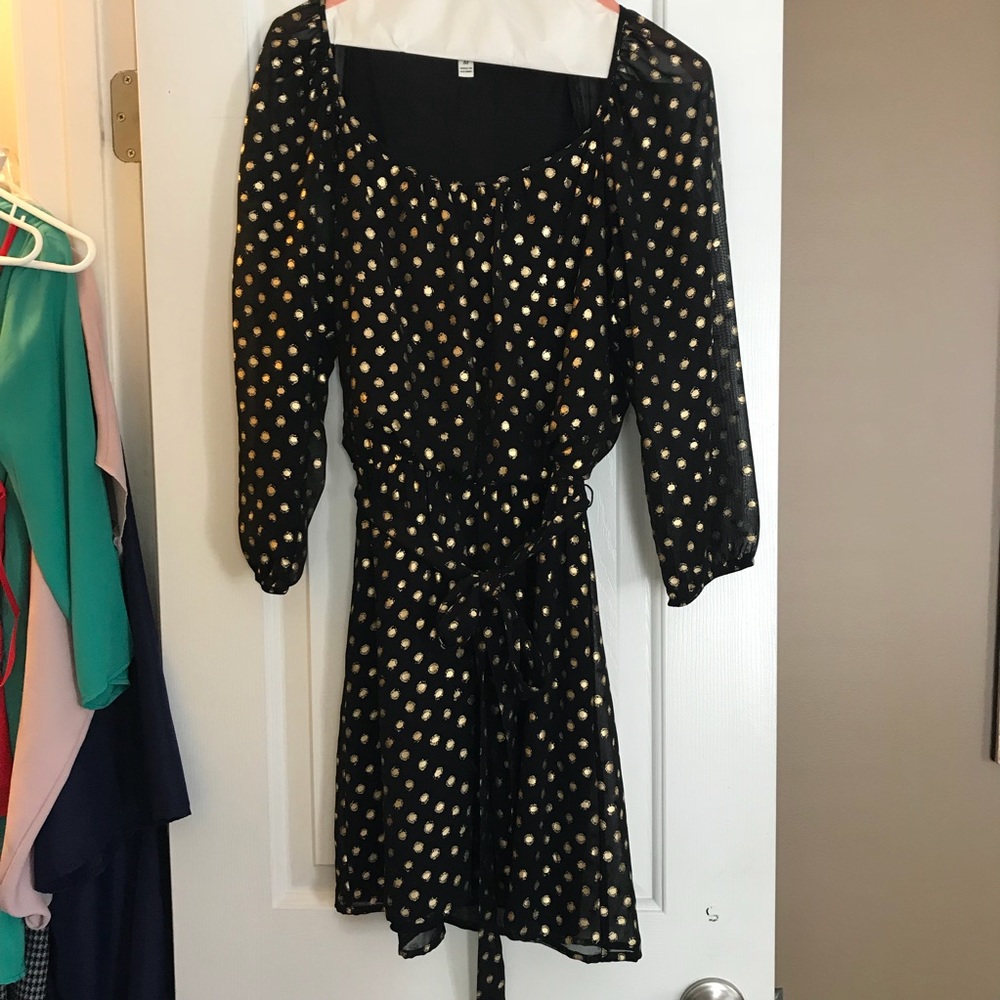 Black dress with gold polka dots
